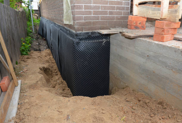 SJ Waterproofing Pros team performing specialized Waterproofing assessment in Virginia, VA